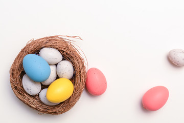 Easter eggs on white background with copy space
