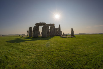 stonehenge at sunrise, clear sunny day