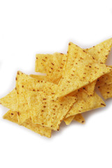 Fototapeta premium Corn Totillas chips isolated on white background. Mexican food also called Nachos