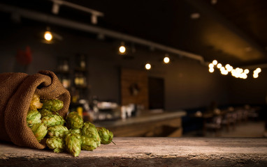 Still life with a keg of beer and hops.