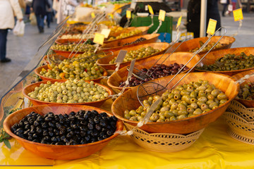 Olives and vegetables for sale at farmers market