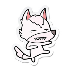 sticker of a cartoon wolf kicking