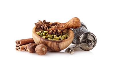 Cardamon, cinnamon, anise and nutmeg on white background. Spices isolated.