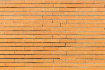 Orange brick wall texture. Architectural detail, closeup. Material background.