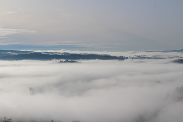 Fog in Chianti hills, Tuscany, Italy