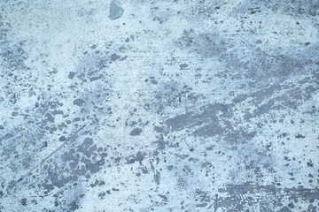 Abstract cement gray dark spotted wall background. Pattern wall