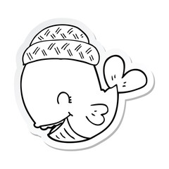 sticker of a cartoon whale wearing hat