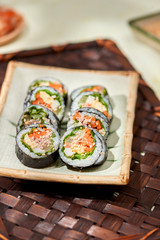 Korean roll Gimbap(kimbob) made from steamed white rice (bap) and various other ingredients