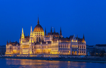 Fototapeta na wymiar Hungarian parliament in Budapest, illuminated building in the night
