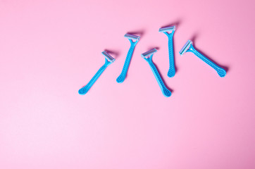 razor care beauty depilation on pink background, top view