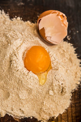 preparation of spaghetti flour egg yolk board wooden cookery