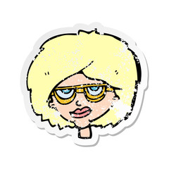 retro distressed sticker of a cartoon woman wearing spectacles