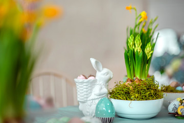 Easter still life - flowers, eggs and rabbit