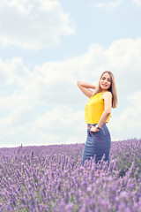 Beautiful woman on the lavender field.