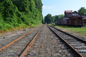 train tracks in a rural area