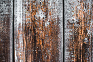 close up of textured brown frosty wooden planks