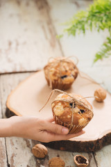 Dellicious homemade nut muffins on table. Sweet pastries