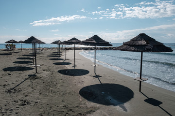 beach with umbrellas