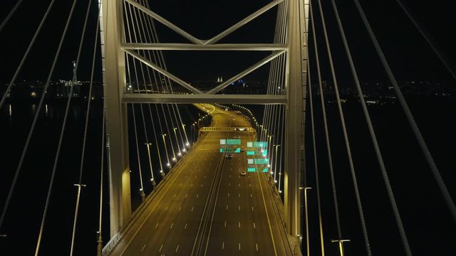 Night aerial view of highway bridge