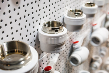 metal pipes, couplings and fittings. Plumbing, fixing pipes and fittings for connection of water or gas systems