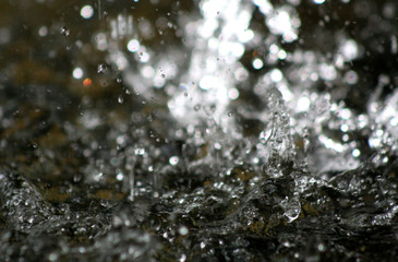 water splashes from waterfall