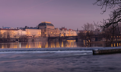 National Theater and the bridge of Legia in Prague at the sunset. The Vltava embankment in the capital of the Czech Republic. - obrazy, fototapety, plakaty