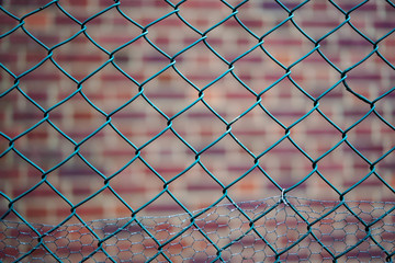 chain link fence with barbed wire