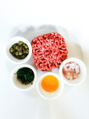 tasty Steak tartare (Raw beef) - classic steak tartare on white plate