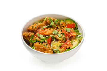 Chinese salad of cucumber and tomato in a plate on a white background