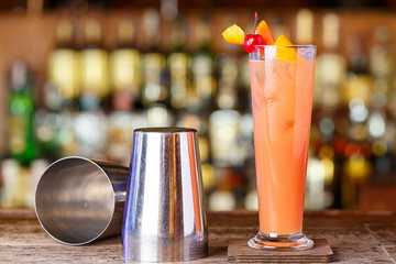 Cocktail next to the shaker at the bar