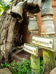 Old rusty waterman in the botanical gardens of Cologne called 