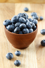blueberries on wooden background
