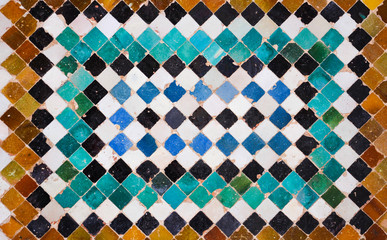 Typical Moorish tile on a wall in the Alhambra, Granada, Spain