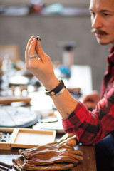 physical examination of item. customer service. quality control. close up cropped photo