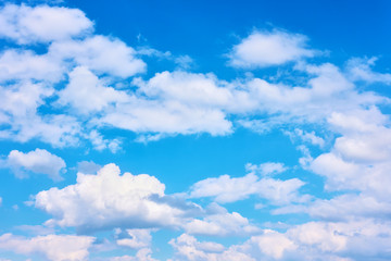 Naklejka na ściany i meble Blue sky with cumulus clouds