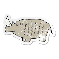 distressed sticker of a cartoon rhinoceros