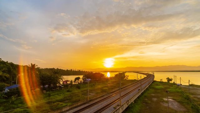 Time Lapse : Floating Railway Over Taiping Lake, Taiping,Malaysia During Sunrise. 4K