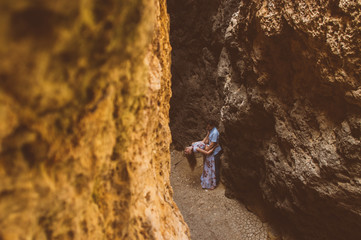 Man and woman walking in the cleft