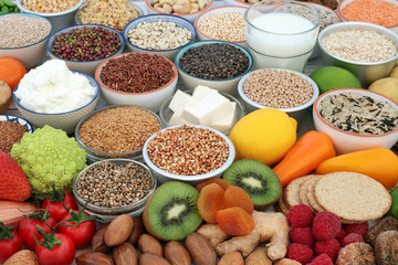 Health food for vegans with almond milk & yoghurt, tofu bean curd, legumes, grains, oatmeal...