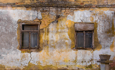 Windows in an abandoned old house in the village of Suvoj in Sisak-Moslavina County in central Croatia