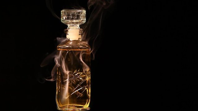 glass perfume smoke dark background nobody hd footage 