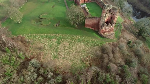 Aerial footage of Bothwell Castle near Uddingston in Scotland. Dramatic location by a winding curve in the River Clyde.