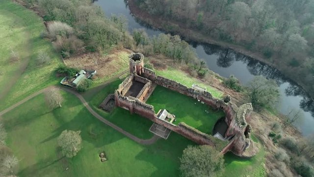 Aerial footage of Bothwell Castle near Uddingston in Scotland. Dramatic location by a winding curve in the River Clyde.