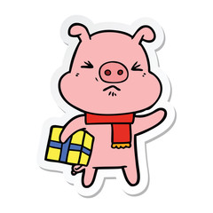 sticker of a cartoon angry pig with christmas present