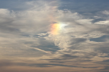 rainbow in sky with clouds