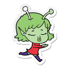 sticker of a cartoon alien girl