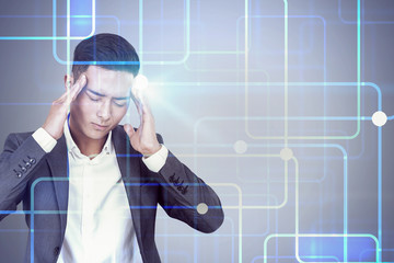 Asian businessman with headache, interface