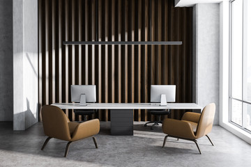 Wooden and concrete manager office interior