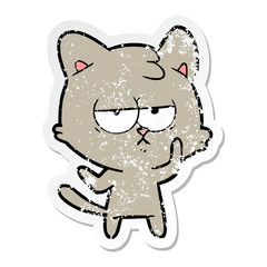 Obraz premium distressed sticker of a bored cartoon cat