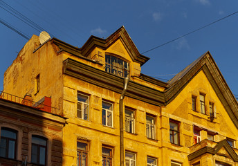 Fragment of town historical houses with mansard